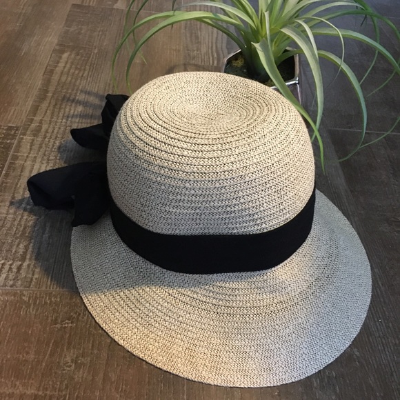 Spring straw hat with black ribbon detail. - Picture 2 of 8